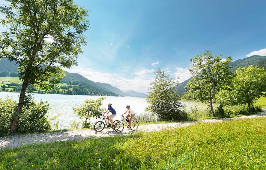 Cyclists at Weissensee in Austria