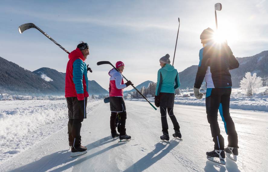 People playing ice hockey